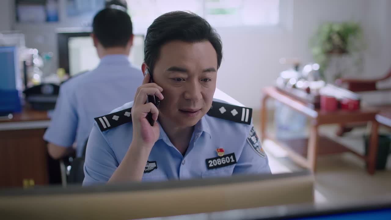 这我在所里上班呢