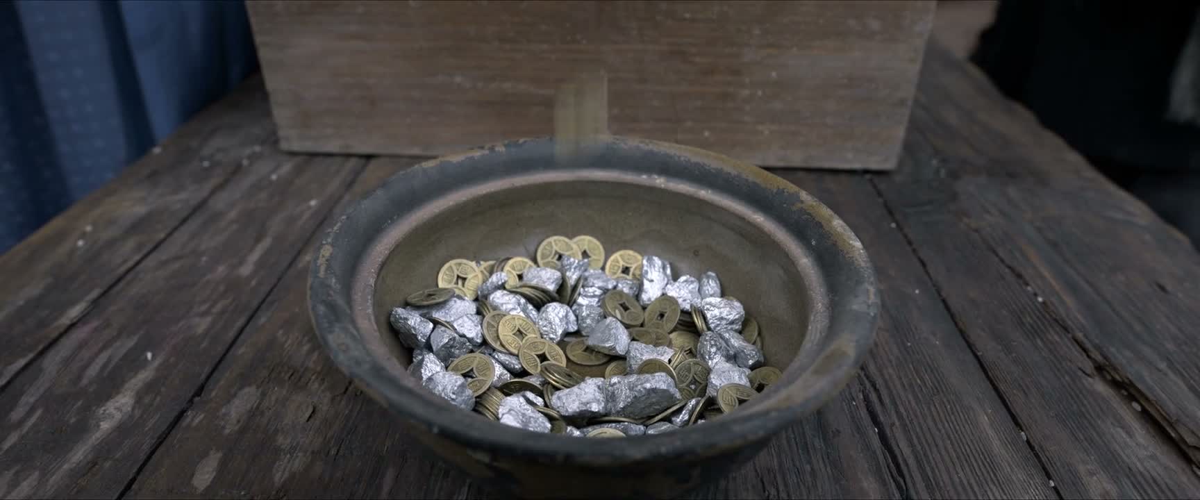 还收受了粮商的贿赂