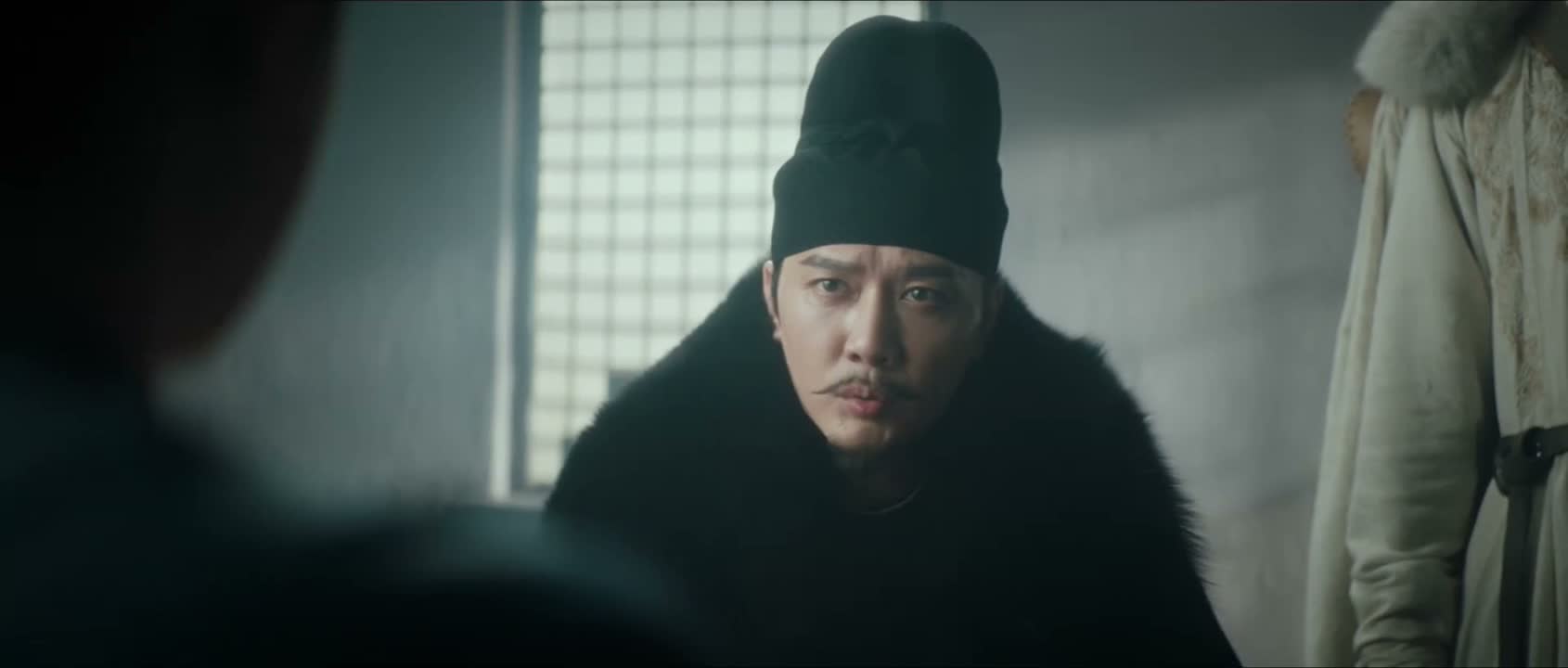 顾七手中